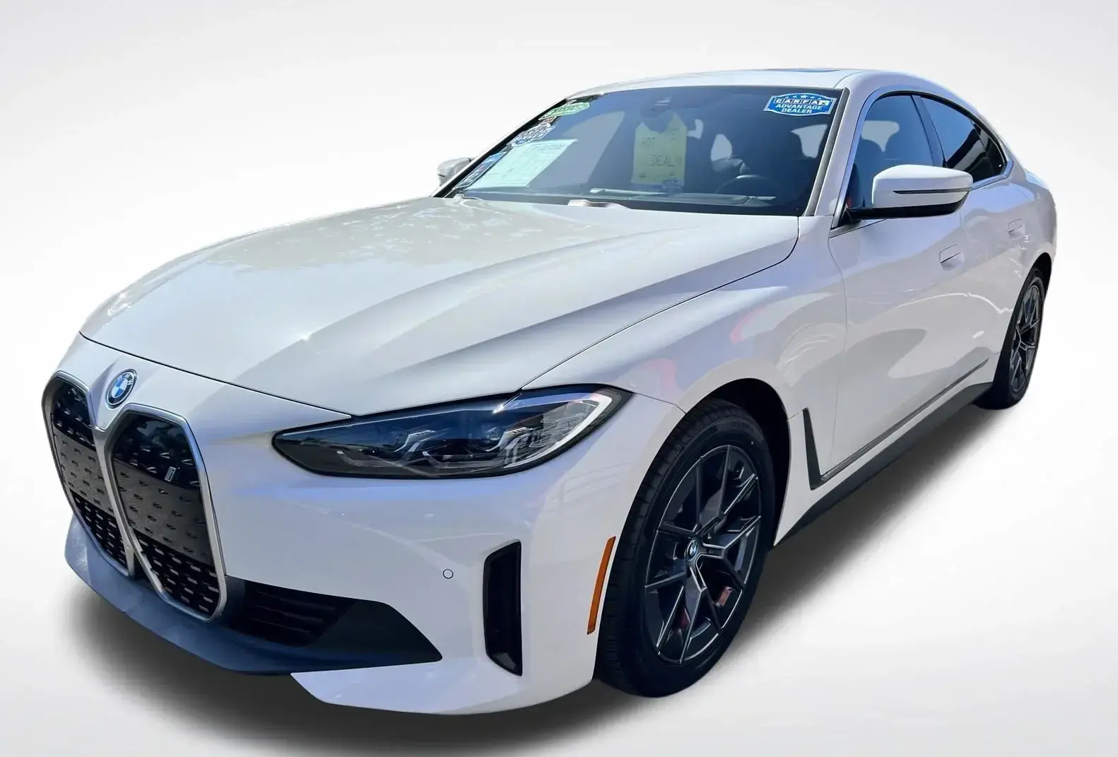 Customer test driving a used BMW i4 for sale at Orlando Preowned on W. Colonial Drive in Orlando